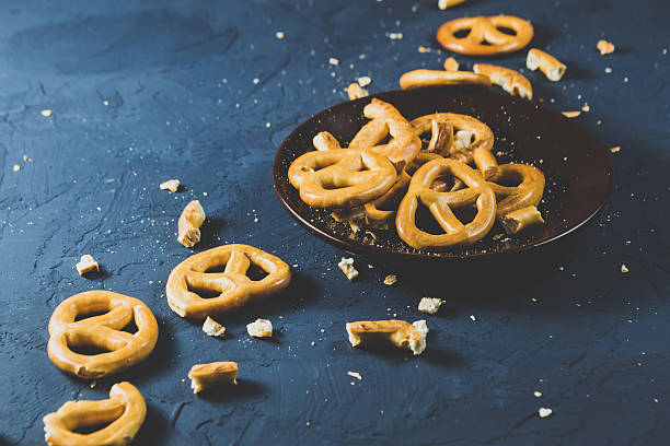 istock Cookies and crumbs on a dark blue background 636716380