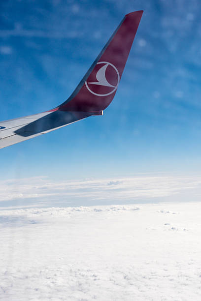 THY, Turkish Airlines airplane wing over the clouds Istanbul, Turkey - June 28, 2016: THY, Turkish Airlines airplane is flying over the clouds upward mobility stock pictures, royalty-free photos & images