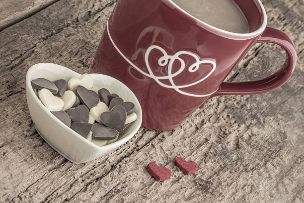 istock coffee and heart shaped chocolates on wooden table 636722096