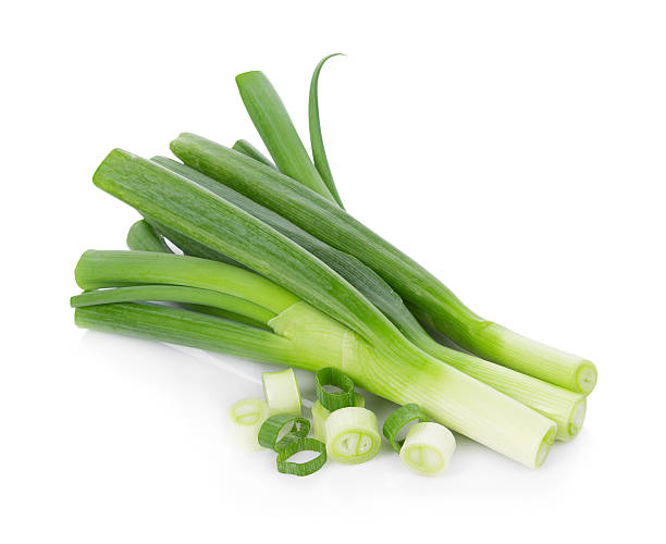 istock Green Japanese Bunching Onion on white background 636722392