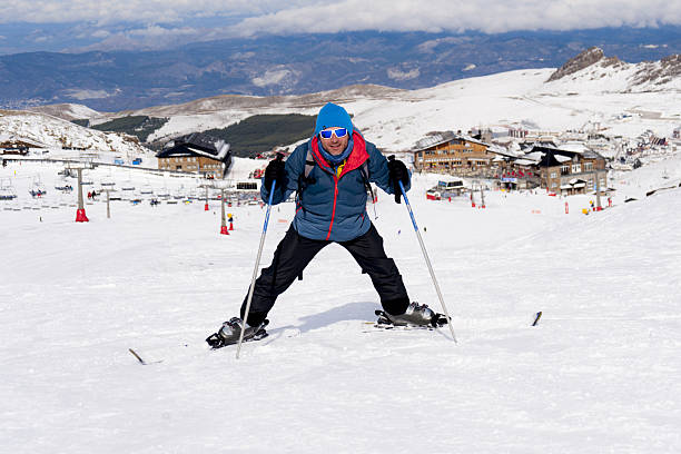 istock happy man happy in snow mountains at ski resort 636722984