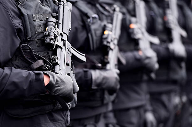Soldier with machine gun during military parade