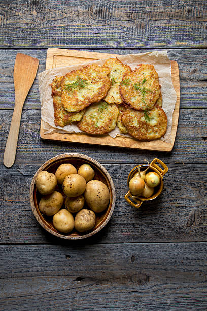 istock Fried potato pancakes on wood 636724836