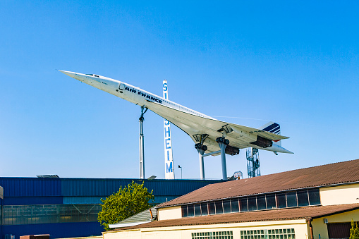 Hillsboro, Oregon, USA - May 22, 2022 : A low fly-by of an Oregon Air National Guard USAF F-15C Eagle. The Air Show in Hillsboro, Oregon is a very popular event each year. The theme for 2022 was “She Flies with her own wings.” All performers, pilots and announcers were women. Hillsboro is a suburb of the city of Portland, Oregon.