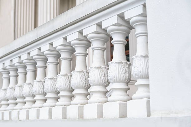 istock White balustrade on the restored facade of the building 636729482