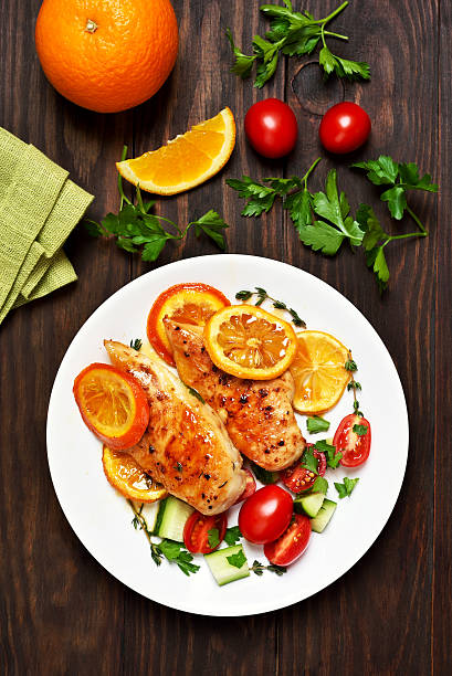 istock Roasted chicken breast with orange sauce 636730614