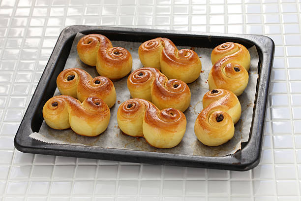 homemade swedish saffron buns, lussekatt - lussebulle bildbanksfoton och bilder