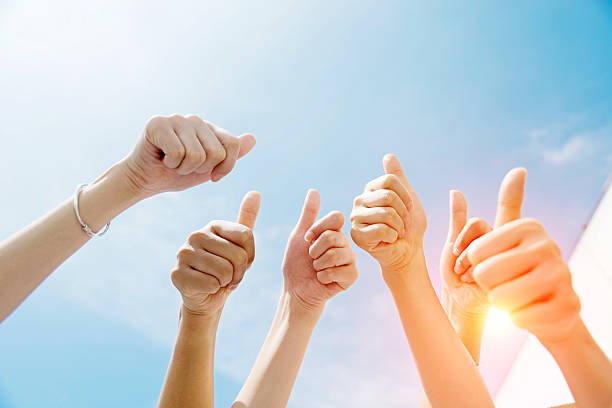 istock Group of people giving thumbs up 636732028