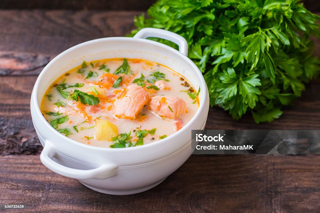 Soup with salmon Finland Soup with salmon Finland . Old background. Top view. Close-up Brown Stock Photo