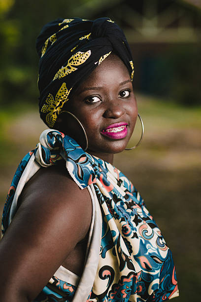 istock Beautiful african young woman 636735324
