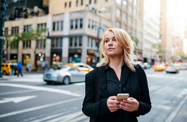 istock Waiting for taxi and texting 636738584