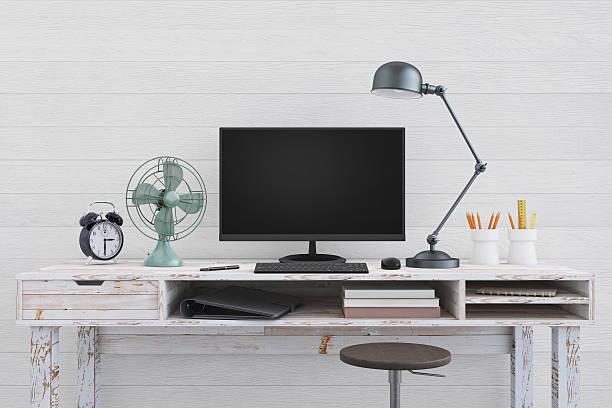 istock Large PC monitor on an office desk 636738920