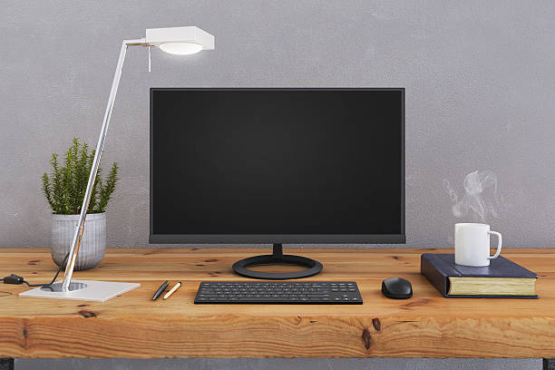 istock Large PC monitor on an office desk 636738958