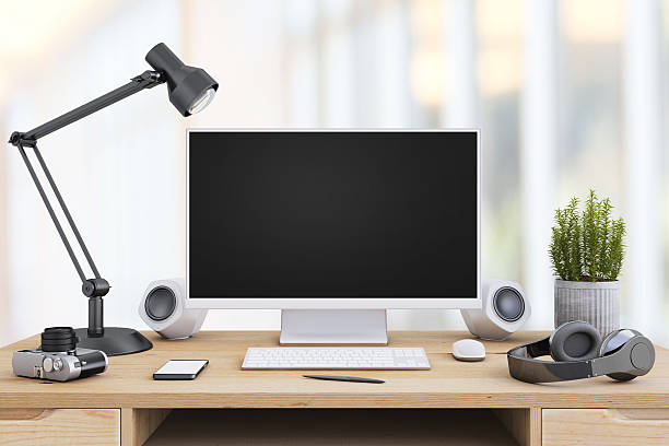 istock Large PC monitor on an office desk 636739012