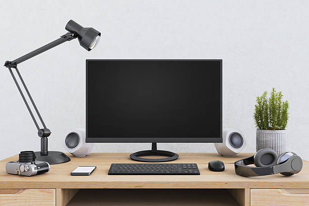 istock Large PC monitor on an office desk 636739022