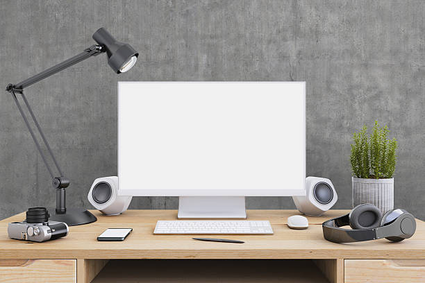 istock Large PC monitor on an office desk 636739036