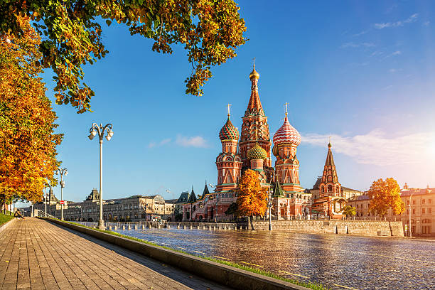 Autumn Gold by the eyes of Cathedral Autumn Gold by the eyes of St. Basil's Cathedral in Moscow in the early morning moscow stock pictures, royalty-free photos & images