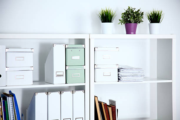 istock Modern office interior with tables, chairs and bookcases 636741642