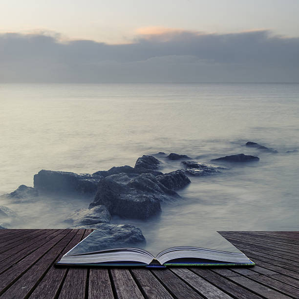 istock Peaceful cross processed landscape image of calm sea over rocks 636742192