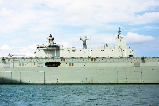 Military ship at the harbour, full frame horizontal composition with copy space