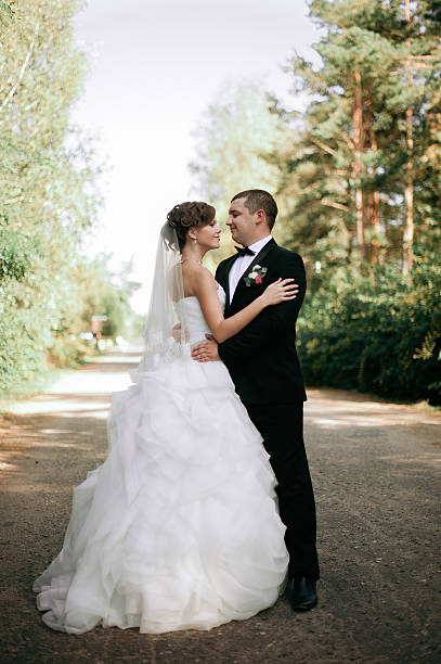 istock Elegant young happy wedding couple 636747144