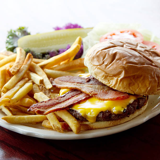 istock Crispy Bacon Cheese Burger and French Fries 636747350