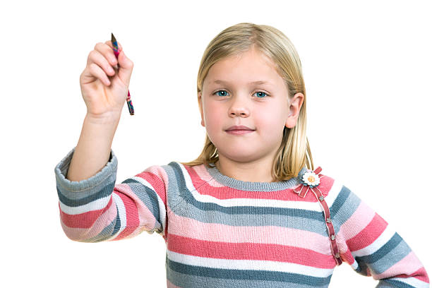 istock cute little girl drawing in the air or imaginary screen 636747410