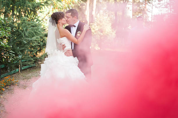 istock Elegant young happy wedding couple 636747658