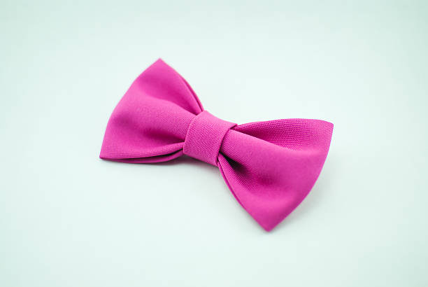 istock Fashionable and trendy pink bow-tie. Isolated 636747734
