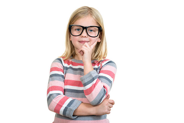 istock Adorable child in glasses thinking isolated on white 636748890