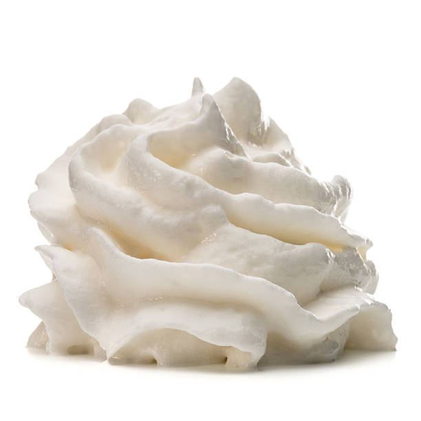 istock Whipped cream swirl  isolated on white background cutout 636749466