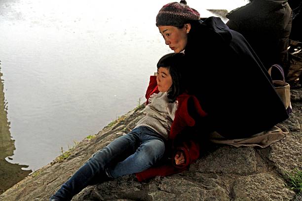 istock Child with a mother under the bridge at Kamogawa 636749864