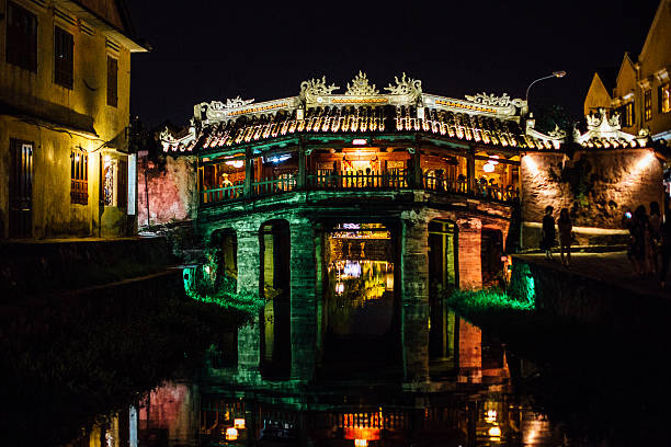 istock The bridge in the lights reflected in the river asia 636750978