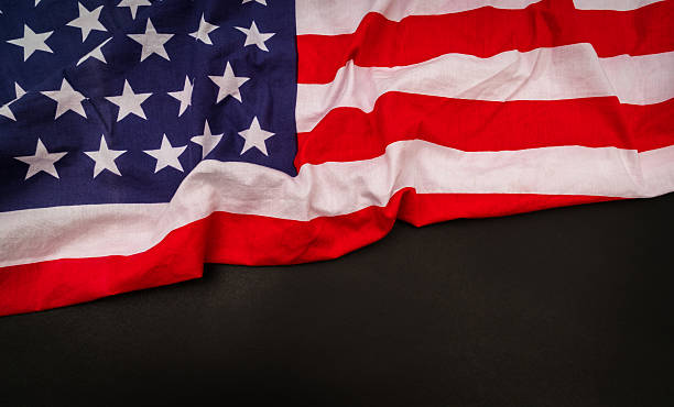 istock American flag on black background 636752604