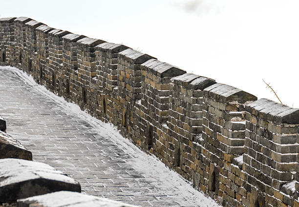 istock The Great Wall of China covered in light snow 636756188