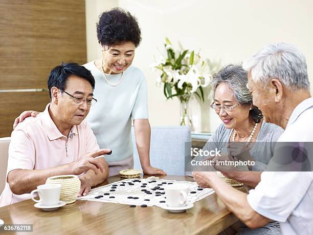 Senior People Playing Weiqi At Home Stock Photo - Download Image Now - Senior Adult, Nursing Home, Hong Kong
