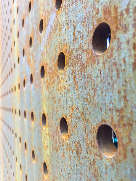 istock Thick Rusty Metal Plate with Holes 636762970