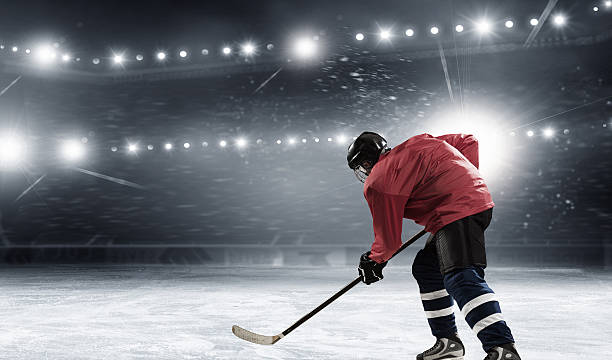istock Hockey player on the ice . Mixed media 636765656