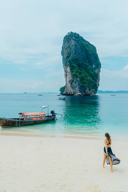 istock Woman on the beach in Thailand 636765782