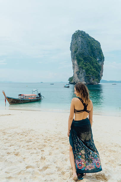 istock Woman on the beach in Thailand 636765820
