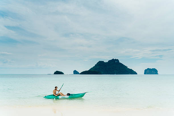 Man kayaking in the sea