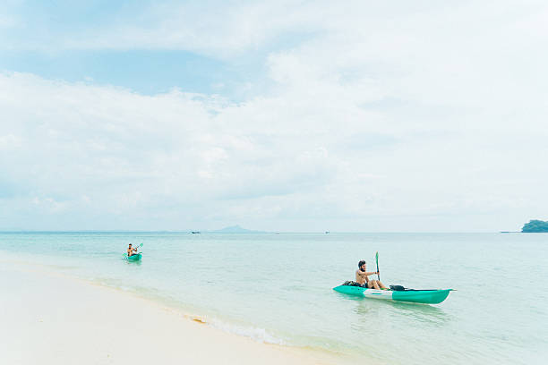 istock Two men kayaking in the sea 636766240