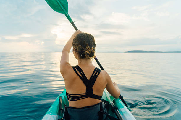 istock Woman kayaking in the sea 636766820