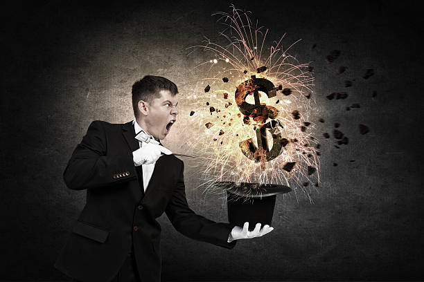 Businessman demonstrating magic . Mixed media Man magician with cylinder hat doing tricks magician money stock pictures, royalty-free photos & images