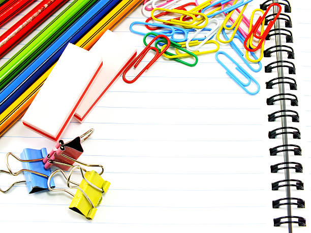 istock notebook  blank paper with stationery supplies for copy space background 636769764