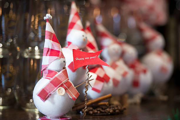 Close up snowmen and red flag  with \