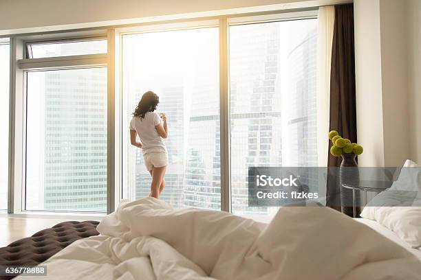 Young Woman After Wake Up Stock Photo - Download Image Now - City, Apartment, Window