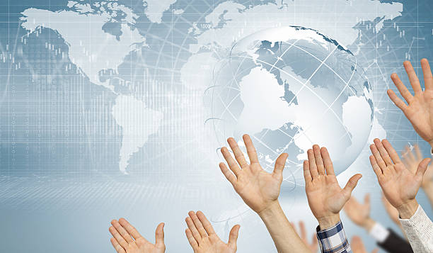 istock Group of people with raised hands . Mixed media 636786868