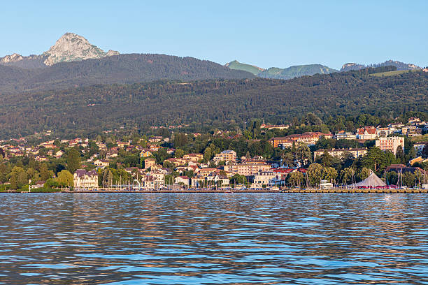 Evian-les-Bains from the Lake Geneva Evian-les-Bains from the Lake Geneva, sailing from the French coast to the Swiss coast. evian les bains stock pictures, royalty-free photos & images