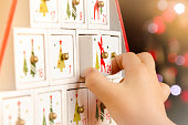 Wooden advent calendar Christmas tree and child